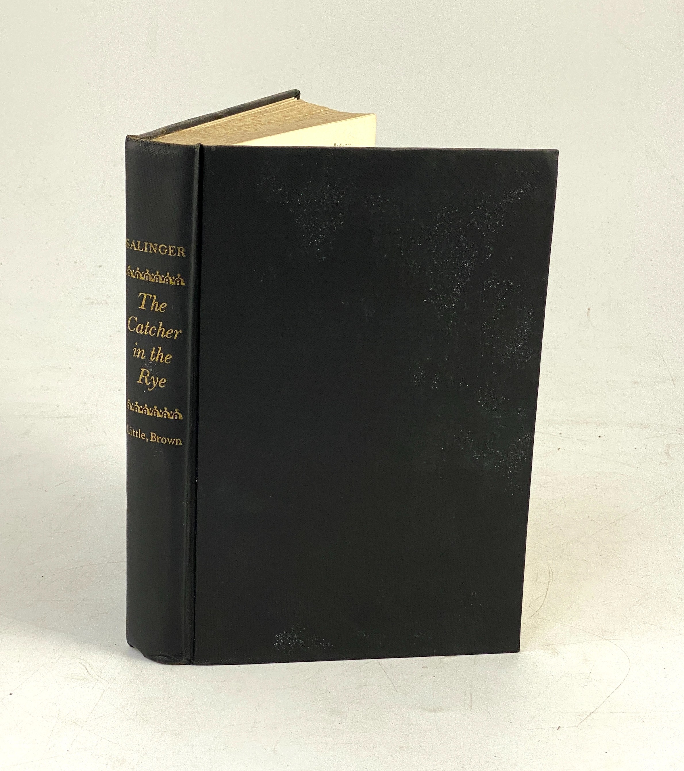 Salinger, Jerome David - The Catcher in the Rye, 1st edition, 8vo, original gilt-stamped black cloth, in 1st issue unclipped d/j printed in red, black and yellow, with photo portrait of the author by Lotte Jacobi on rear